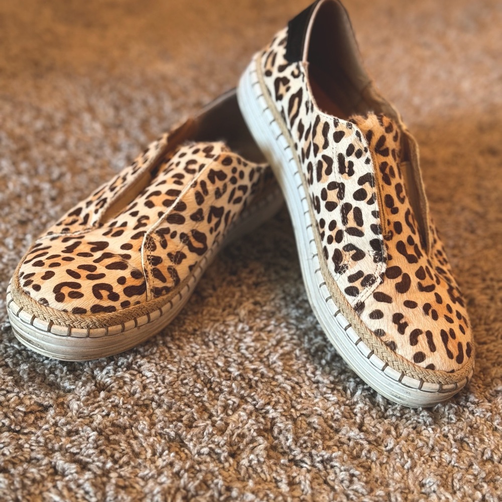 J/Slides slip on sneakers.